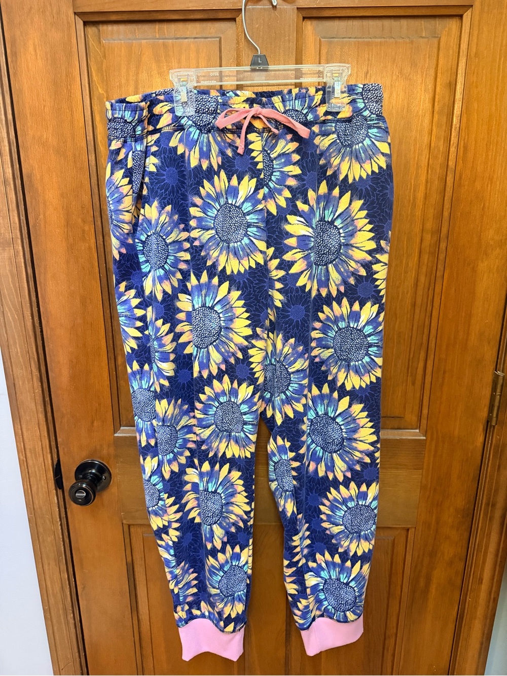 LuLaRoe Navy Blue Sunflower Joggers with Pink Accents